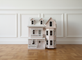 Load image into Gallery viewer, Pink wooden dollhouse with white trim
